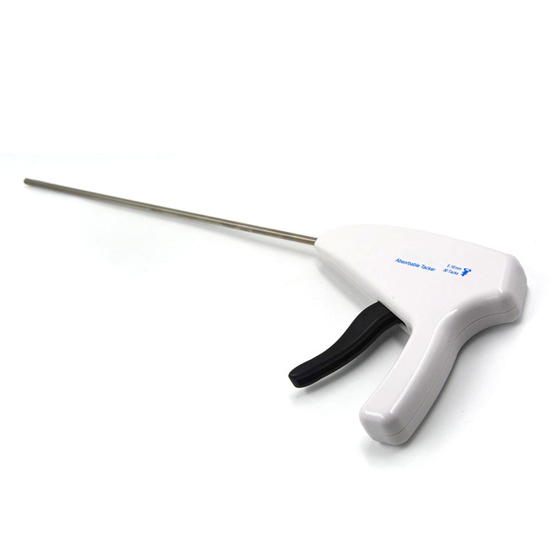 Absorbable tacker fixation device for laparoscopic hernia repair