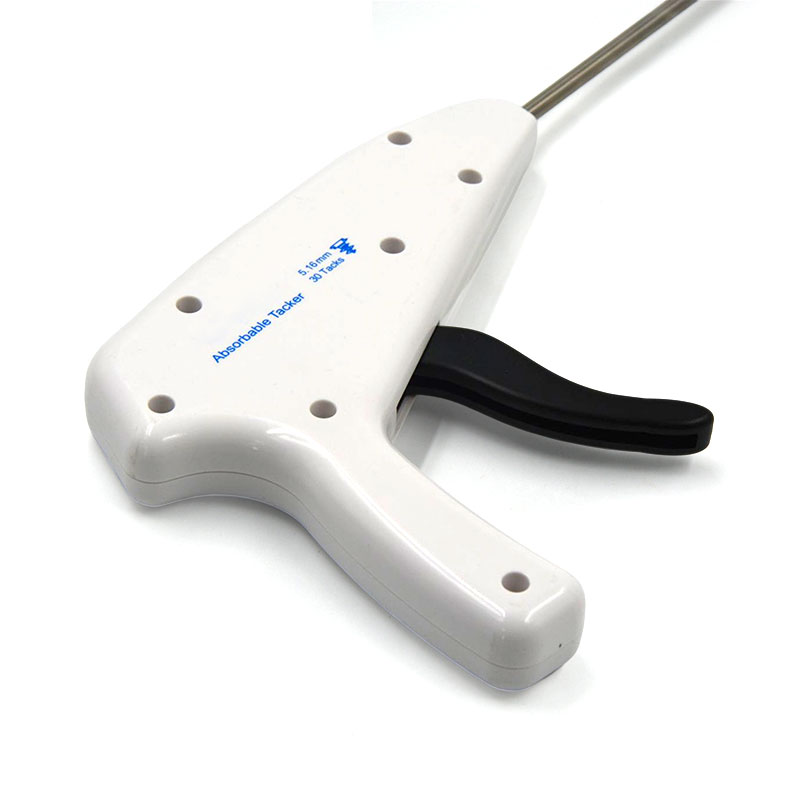 Absorbable tacker fixation device for laparoscopic hernia repair